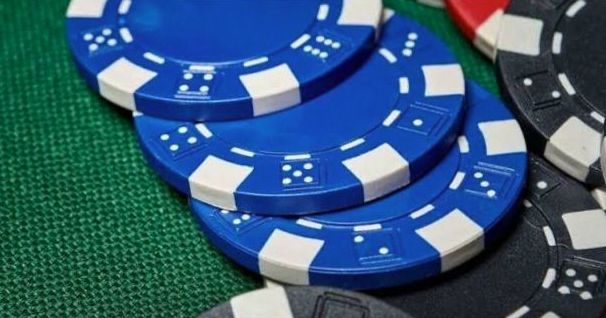 Private casino-style party table set with chips and playing cards
