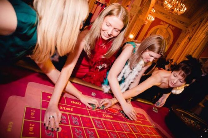 Close-up of casino-style event details including chips and décor accents