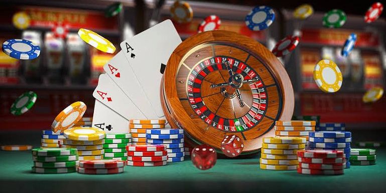 Poker-inspired table setup with cards and chips for a themed event